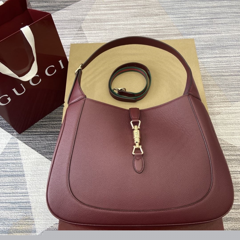 G*u*i top handle bags